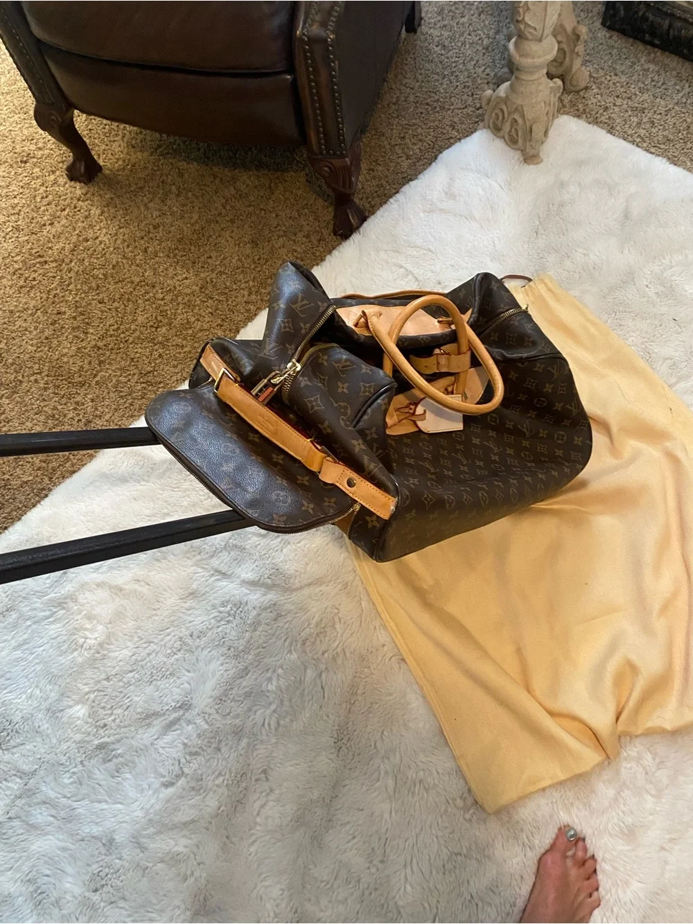 Louis Vuitton Monogram Canvas rolling Travel Bag with Natural Vachetta Trim